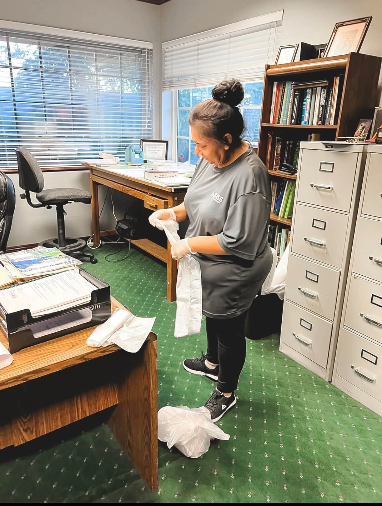 janitorial office cleaning changing trash liners for a commercial cleaning client